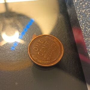 1941 wheat penny Error "L" in Liberty